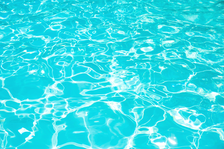 Beautiful ripple wave and blue water surface in swimming pool, Blue water surface for backgroundの写真素材