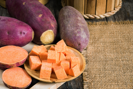 Preparation sweet potato slice for cooking, Purple raw potatoes for healthy eating and healthy lifestyle, Nutrient purple raw food and high antioxidantの写真素材