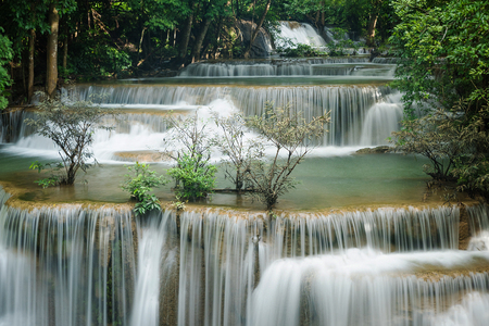 Beautiful and Breathtaking green waterfall, Erawan's waterfall, Located Kanchanaburi Province, Thailandの写真素材