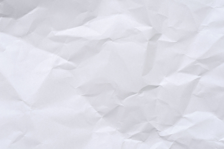 White crumpled paper background and textureの写真素材