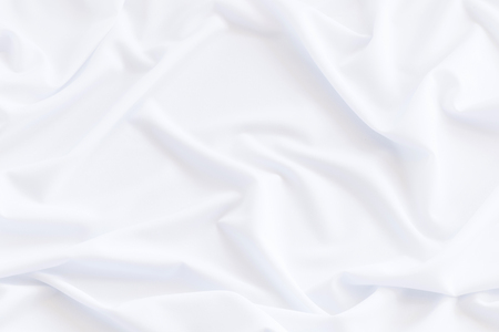 Abstract white drapery cloth, Pattern and detail grooved of white fabric for background and abstractの写真素材