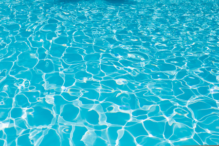 Beautiful ripple wave and blue water surface in swimming pool, Blue water surface for backgroundの写真素材