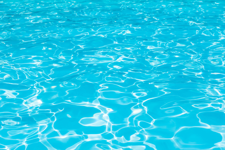 Blue water surface in swimmjng pool for backgroundの写真素材