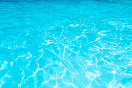 Blue water surface in swimming pool for blue abstract or backgroundの写真素材