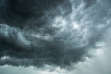 Motion of dark sky and black clouds, Dramatic cumulonimbus cloud with rainy