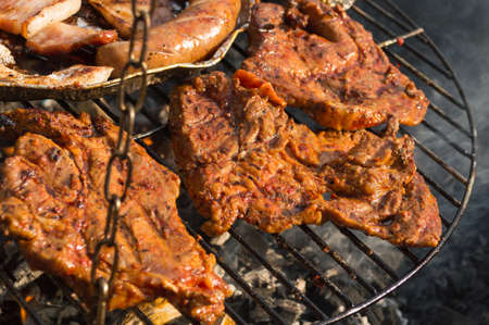 Meat and Sausages on the grillの写真素材