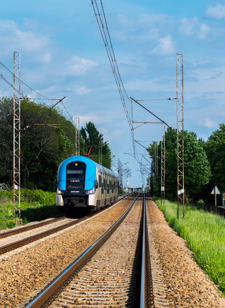 Train on track with bluesky Polandのeditorial素材
