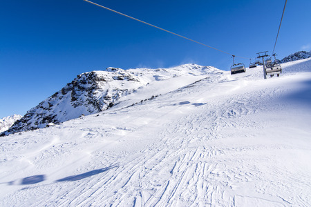 Chair lift at mountain peak, Italy ski resort Soldaの写真素材
