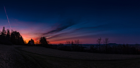 Colorful sunset on a meadow.Beautiful moment the miracle of natureの写真素材