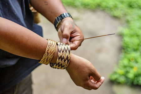 Detailed photography of wooden handmade braceletの写真素材