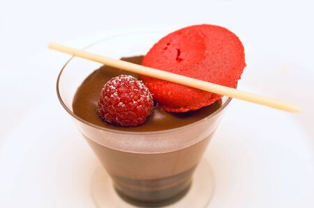 Chocolate dessert with wild berry and marzipan toppingの写真素材