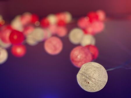 Red and yellow light ball decorations hangingの写真素材