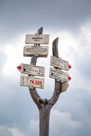 direction sign on mountains, signpost, tourist markingsの写真素材