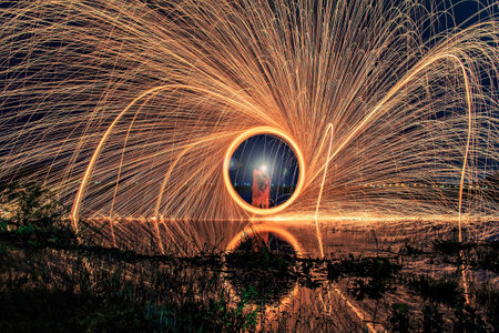 Burning steel wool fireworks