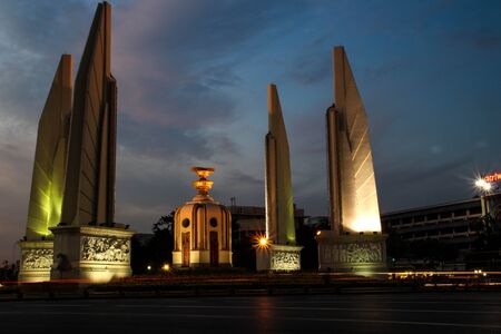 May 2, 2016: At Bangkok Thailand. Democracy Monument and dramatic sunset sky.