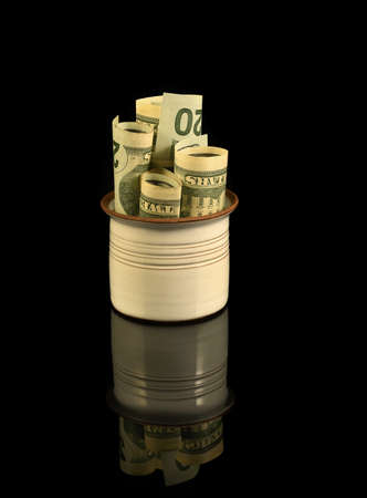 Savings in US dollars, Dollars assorted bills, cash pile backgroundの写真素材