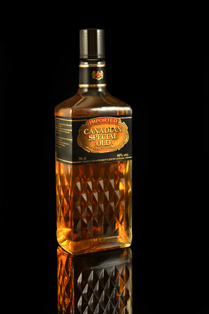 Bottle of Canadian Special Old Whiskey on black background - illustrative editorialのeditorial素材