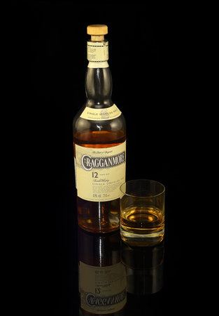 Cragganmore Single Malt Scotch whiskey on black background, distillery Ballindalloch. Whiskey is a major export item of Scotland - illustrative editorialのeditorial素材