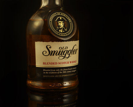 Old Smuggler blended Scotch whiskey bottle. Whiskey is a major export item of Scotland -...