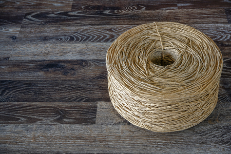 An old rolled cotton cord. It was used for various purposes. For bonding straw, hay, making thick roses. While today it is used to decorate a variety of objects.の写真素材