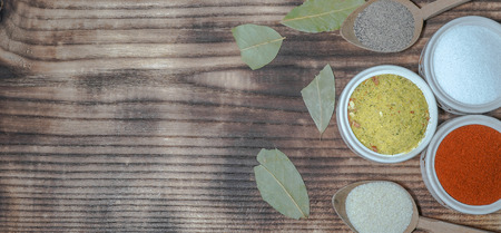 Everyday flavorings for a kitchen in a bowl and a charcoal broken leafs