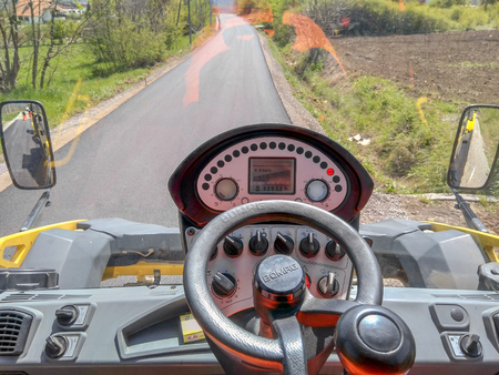 Sokobanja, Serbia - April 25, 2019: A view from the cabin of a roller that is ascending during the asphalt road in Sokobanja Serbiaのeditorial素材