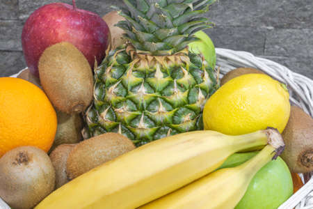 Close up of exotic fruits on a pile in a basketの写真素材