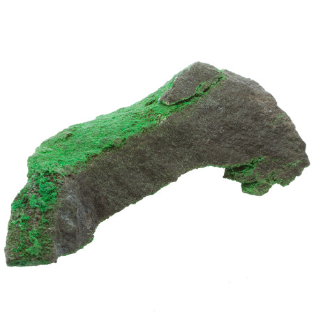 Uvarovite rough specimen on white backgroundの写真素材