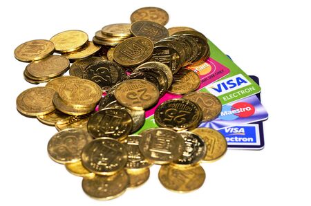 Credit card and coins on white backgroundのeditorial素材