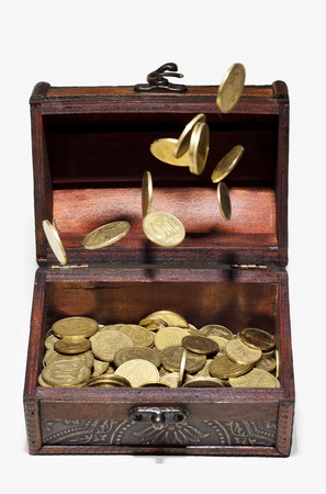 Coins in the air and in a box on a white background  Ukrainian money, hryvnia の写真素材