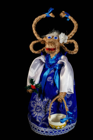 Funny goat clothes on a black background. For New Year\'s greetings.の写真素材