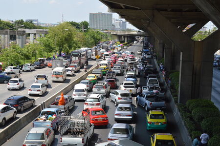 Bangkok, Thailand - May 10, 2014 - People s Democratic Reform Committee  PDRC by the leader Buddha Isara in the entrance of Centre for Resolution of Emergency Situation on Vibha-vadee road, the effect traffic jam for long ways のeditorial素材