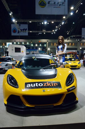 Motor pretty at Auto Salon 2013 BANGKOK, THAILAND- June 22,2013  Unidentified female presenters  car at Bangkok Auto Salon 2013 ,IMPACT Exhibition and Convention Center, maungthong thani のeditorial素材