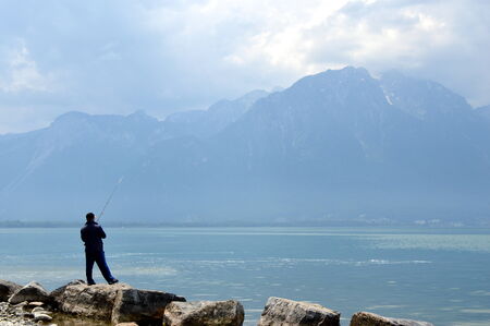 fishing in Geneva lakeの写真素材