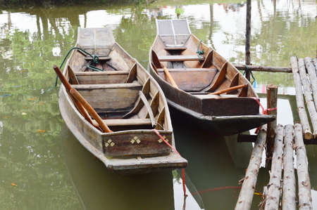 row boat on the wood pierの写真素材