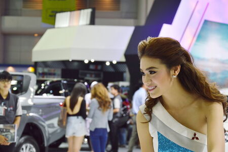 Motor Expo 2014 BANGKOK, THAILAND- December 4,2014  unidentified model Mitsubishi motor booth at Impact Challenger Muengthong Thaneeのeditorial素材