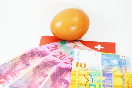 egg and Swistzerland  banknoteの写真素材