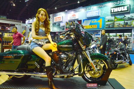 Motor show 2015 BANGKOK, THAILAND- March 26, 2015 unidentified model in Harley-Davidson booth at Impact Challenger Muengthong Thaneeのeditorial素材