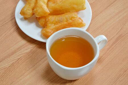 tea cup and deep-fried dough stick