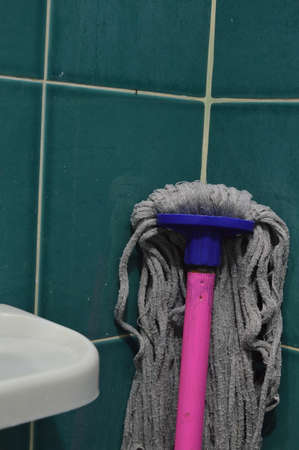 mop in the bathroomの写真素材