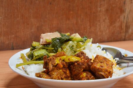 spicy pork rib stir with curry and flat beanの写真素材