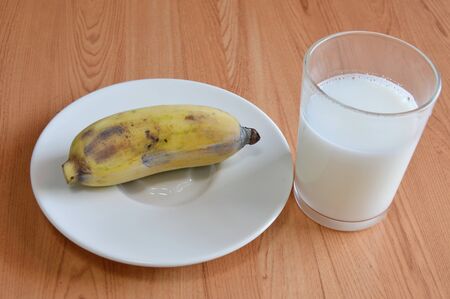 cultivated banana and milk glassの写真素材