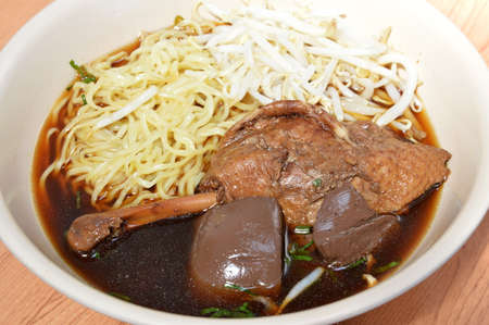 egg noodle with boiled duck in brown soup