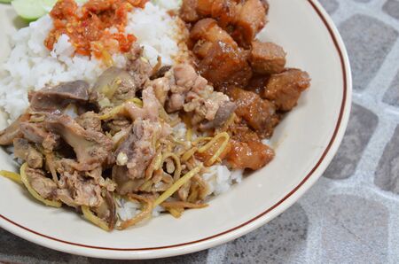 stir fried chicken innards with ginger and sweet porkの写真素材