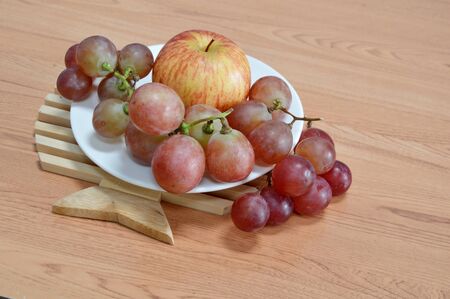apple and red grapeの写真素材