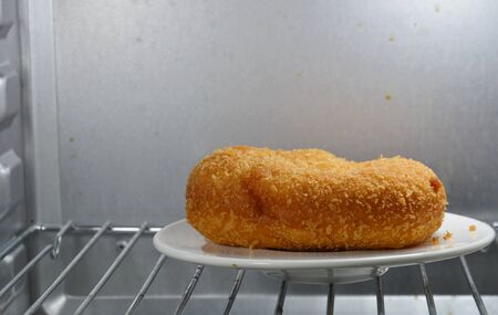 bread filling chicken curry in electric oven