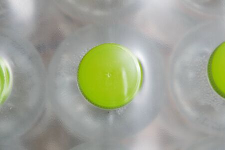 green cap water bottle