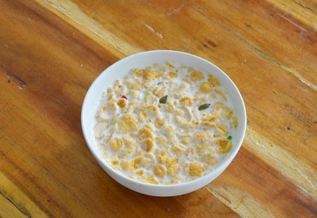 cornflakes and milk in circle bowlの写真素材