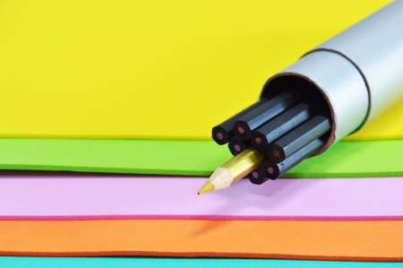 pencil in grey box on color foam rubber board overlay