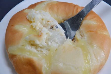 fork on bread filling coconut jamの写真素材